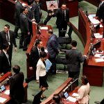 Hong Kong assembly in chaos; attack on democracy leader a ‘chilling signal’