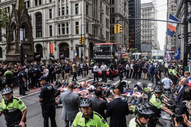 Nearly 300 arrested as climate activists block central London roads