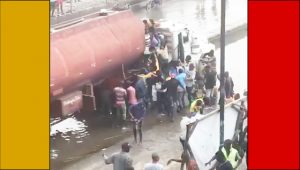 People-scooping-fuel-from-the-tanker
