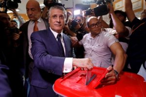 Tunisians vote for new president in runoff election