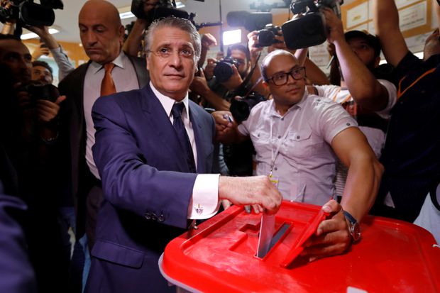 Tunisians vote for new president in runoff election