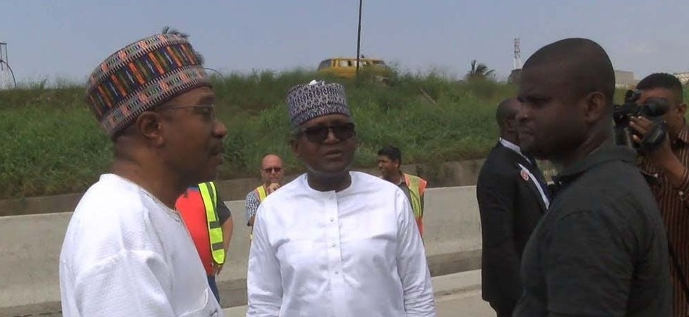 Emefiele (left), Dangote (middle)