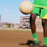 Football coach held for rape of 9-year-old boy