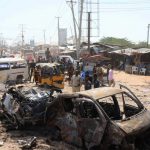 A general view shows the scene of a car bomb explosion at a checkpoint in Mogadishu