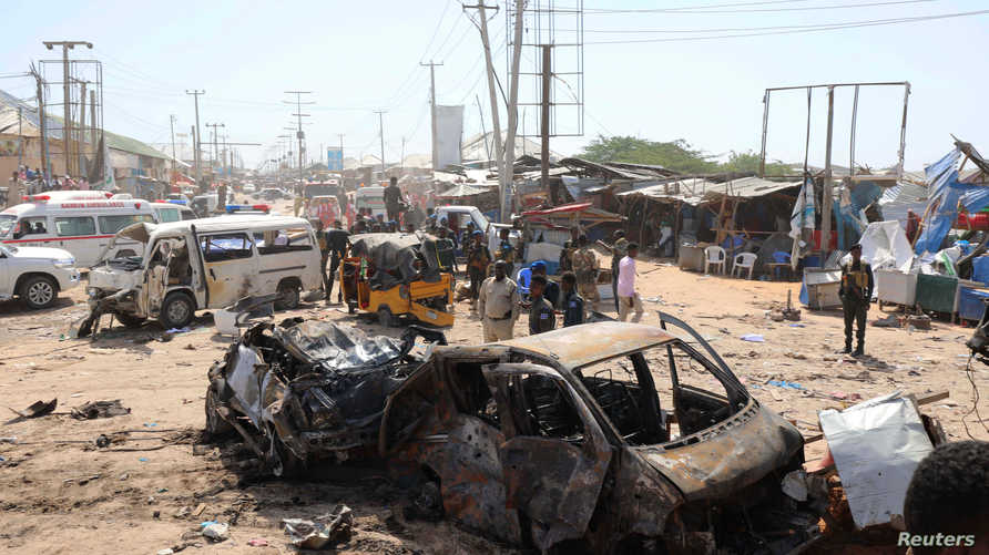 A general view shows the scene of a car bomb explosion at a checkpoint in Mogadishu