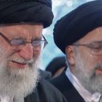 Iranian Supreme Leader Ayatollah Ali Khamenei, left, openly weeps as he leads a prayer over the coffin of Gen. Qassem Soleimani, who was killed in Iraq in a U.S. drone strike on Friday, at the Tehran University campus, in Tehran, Iran, Monday, Jan. 6, 2020. (Iran Press TV via AP)