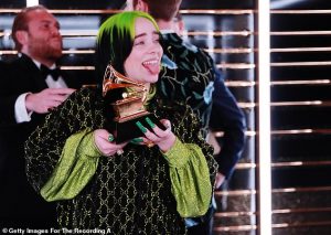 23917232-7932583-It_s_a_sweep_With_her_wins_she_became_the_youngest_to_ever_sweep-a-1_1580114908681