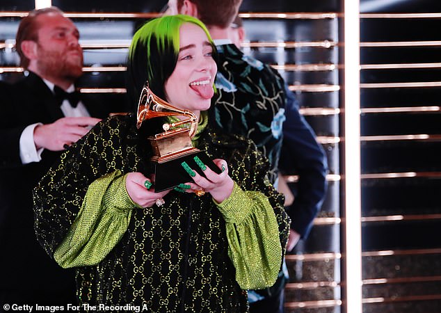 23917232-7932583-It_s_a_sweep_With_her_wins_she_became_the_youngest_to_ever_sweep-a-1_1580114908681