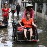 66 killed in Indonesian floods as officials warn of more heavy rain