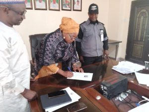 The-Permanent-Secretary-Kaduna-State-Ministry-of-Education-Mrs-Phoebe-Sukai-signing-a-Memorandum-of-Understanding-with-the-Kaduna-State-Vigilance-Service-to-secure-public-schools-in-the-state