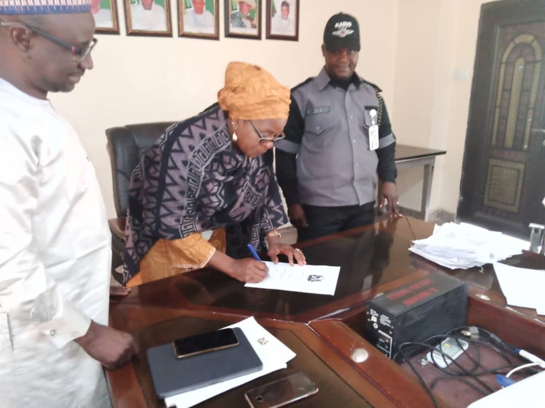 The-Permanent-Secretary-Kaduna-State-Ministry-of-Education-Mrs-Phoebe-Sukai-signing-a-Memorandum-of-Understanding-with-the-Kaduna-State-Vigilance-Service-to-secure-public-schools-in-the-state