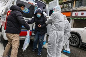 American dies of coronavirus in China, 5 Britons infected