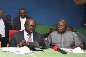 Edo State Governor Godwin Obaseki (left) with Lawrence Okah (right)