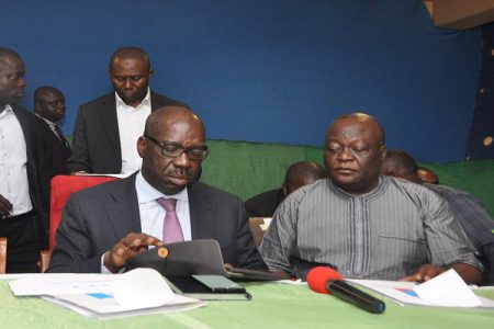 Edo State Governor Godwin Obaseki (left) with Lawrence Okah (right)
