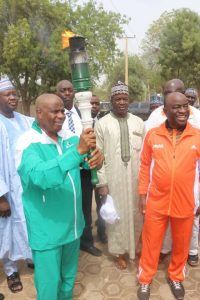 Tambuwal receeiving the unity tourch