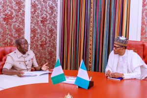 Adams Oshiomhole speaks with President Muhammadu Buhari