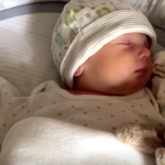 Screenshot of baby Dominic Hutton sleeping taken on April 14, 2020. (Reuters)
