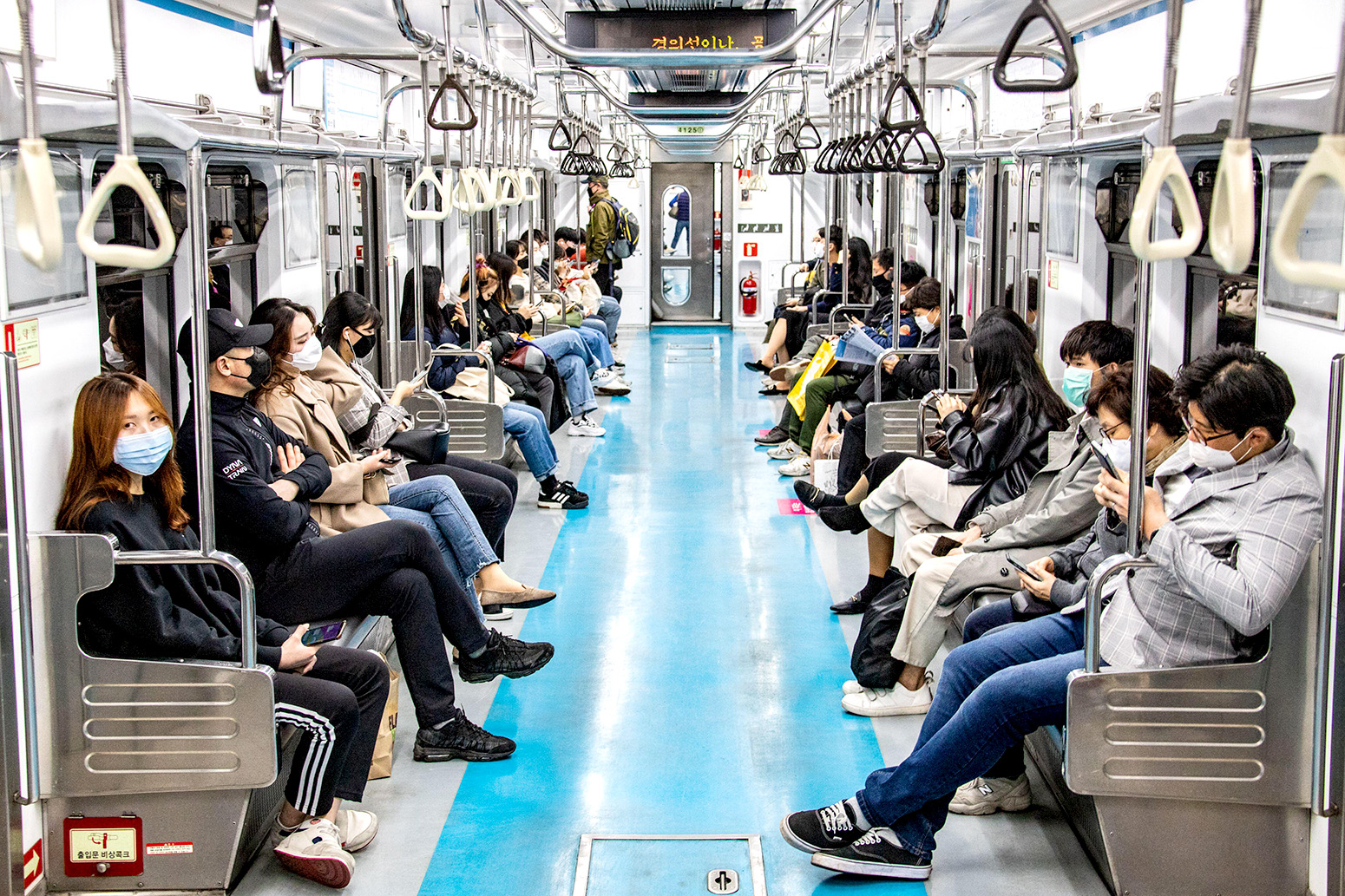 Most riders wearing protective masks during the Coronavirus pandemic, Seoul, South Korea