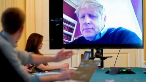 British PM Boris John attends a meeting via videoconference