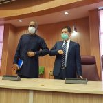 The Minister of Foreign Affairs, Geoffrey Onyeama (l), and the Chinese Ambassador to Nigeria, Dr Zhou Pingjian, after a briefing in Abuja on the alleged maltreatment of Nigerians in Guangzhou, China