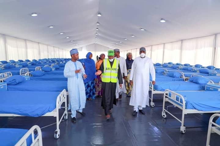 Kano State Governor Abdullahi Umar Ganduje inspects an isolation centre