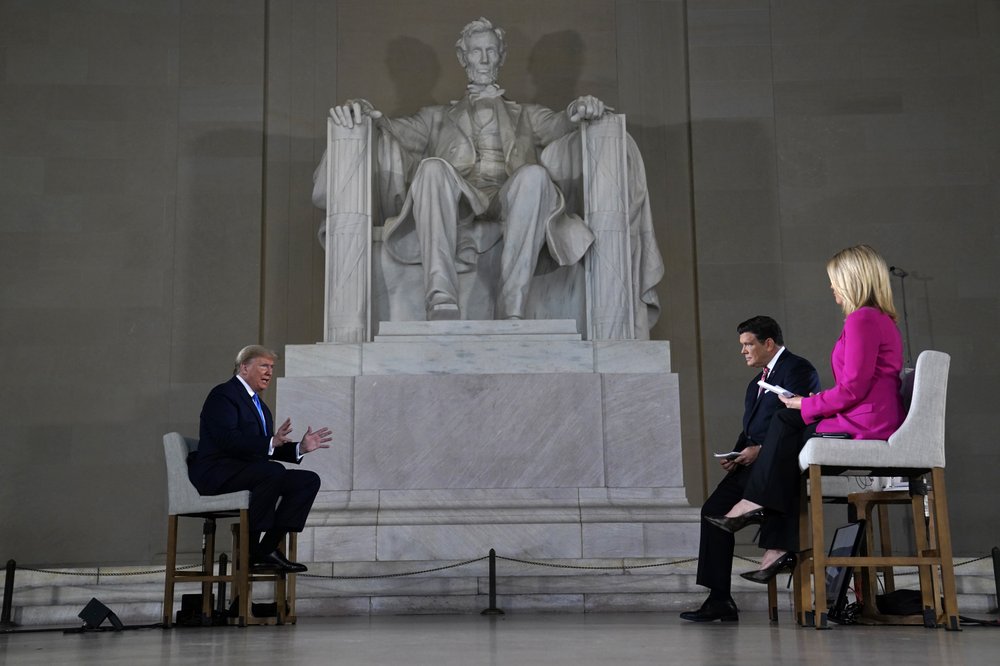 President Donald Trump speaks during a Fox News virtual town hall from the Lincoln Memorial, Sunday, May 3, 2020, in Washington, co-moderated by FOX News anchors Bret Baier and Martha MacCallum. (AP Photo/Evan Vucci)