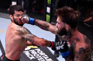 Raphael Assuncao (left), Cody Garbrandt (right)