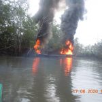 Boats set ablaze