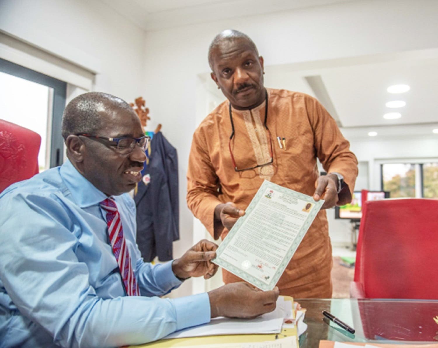 Edo State Governor Mr Godwin Obaseki, with the MD of EDOGIS, Frank Evbuomwan in Government House, Benin City
