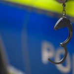 Themenbild Polizei, Polizei, Streifenwagen, Polizist mit Handschellen, Polizist mit Dienstpistole Baden-Württemberg Deu