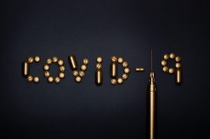 pills-on-blue-background-3936358-scaled