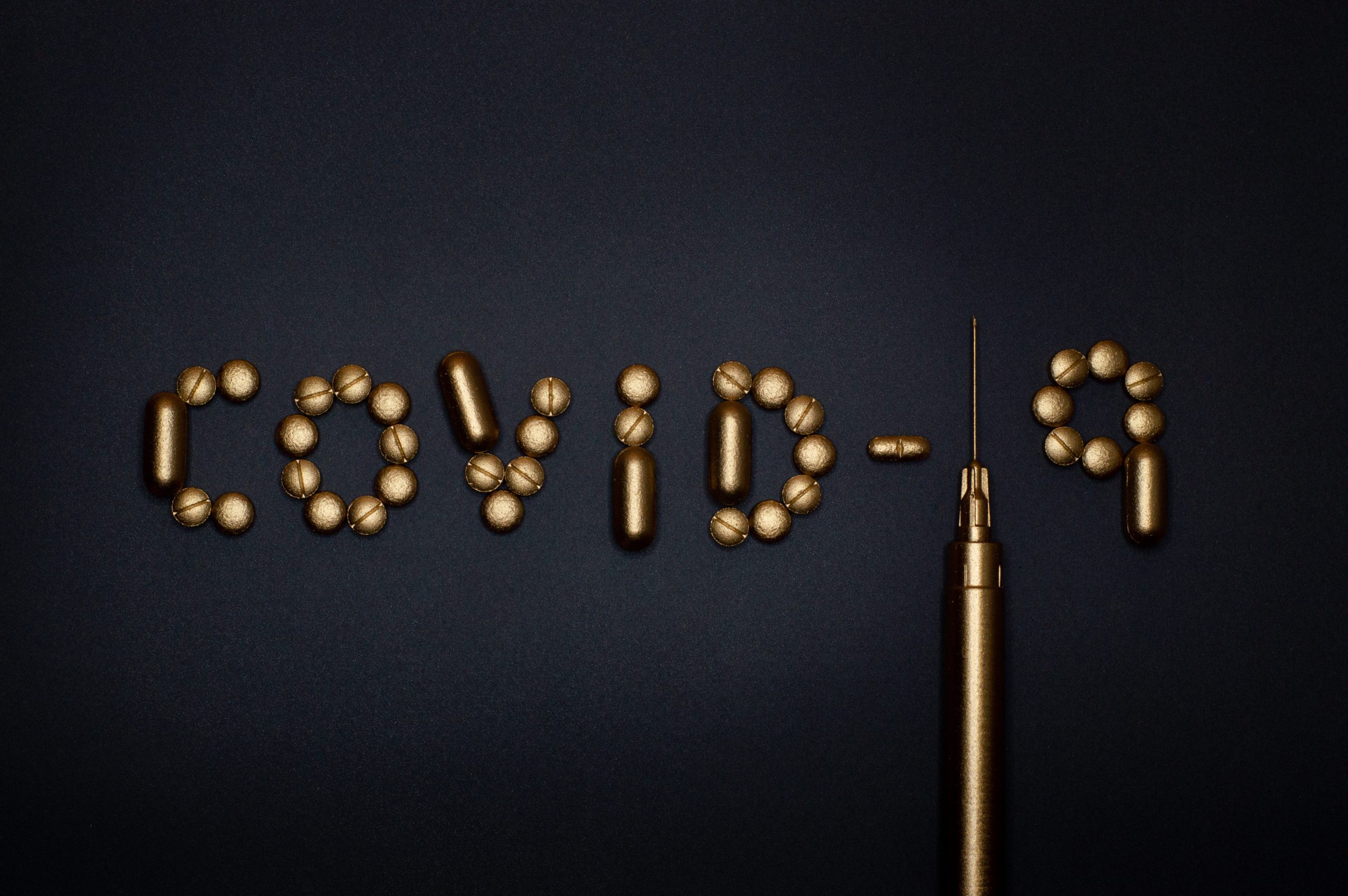 pills-on-blue-background-3936358-scaled