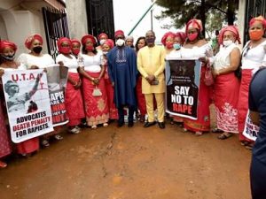 Members of the United Traders Association [UTA] in a group photograph with Hon. Paschal Agbodike and Hon. Nonso Okafor at the Anambra State House of Assembly