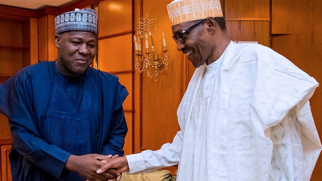 Former Speaker of the House of Representatives Yakubu Dogara (left) with President Muhammadu Buhari