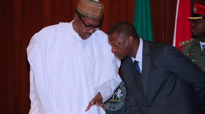 President Muhammadu Buhari (left) and Attorney-General of he Federation/Minister of Justice Abubakar Malami
