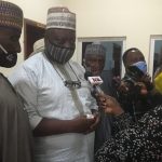 The National President of MHWUN, Josiah Biobelemoye, (centre), addressing journalists