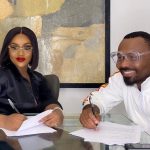 Chef Chioma signing the contract
