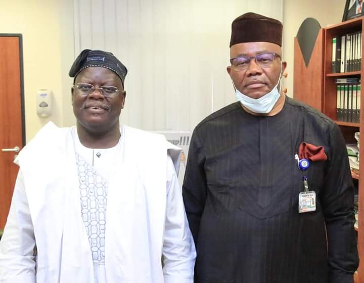 Minister of Niger Delta Affairs Godswill Akpabio (right) with acting Clerk to the National Assembly, Olatunde Ojo (left)