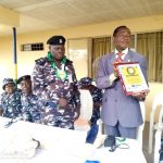 Group coordinator Mr Efe-Khaese Osano while presenting the award to the DPO, CSP Mukhtari Bello
