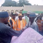 NEMA officials with House of Representatives member representing Suru/Bagudo, Hon Bello Kaoje, Chairman SEMA Kebbi and Alh Sanih Dododo with other dignitaries handing over relief materials to the affected victims