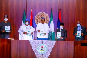 President Muhammadu Buhari (C) with (R-L): Chairman of ICPC Prof Bolaji Owasanoye, CJN Justice Tanko Muhammad, Senate Pres Ahmed Lawan and SGF Boss Mustapha during the Launch of National Ethics and Integrity Policy at the Virtual 2nd National Summit on Diminishing Corruption in the Public Sector
