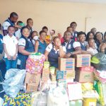 Some members of AIHSOSA’99 during the presentation of the items to the orphanage home