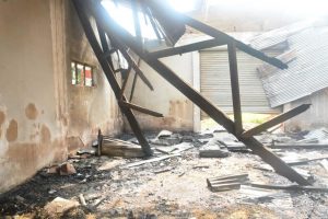 The remains of the SEMA warehouse in Ado Ekiti looted and burnt by suspected hoodlums during the visit by the Deputy Governor