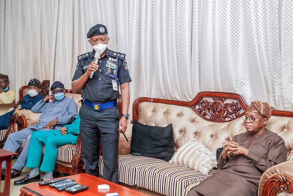 Deputy Inspector-General of Police (South-West) Leye Oyebade (standing centre) visits Osun State Governor Gboyega Oyetola (sitted right)
