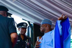 L-R: Inspector-General of Police Mohammed Adamu, Kogi State Governor Yahaya Bello