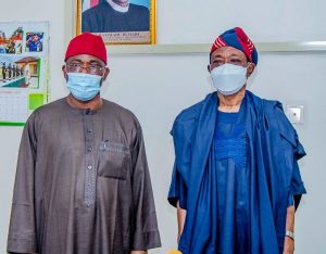 Minister of Interior Rauf Aregbesola (R) and NAHCON Chairman Zikrullah Hassan (L)