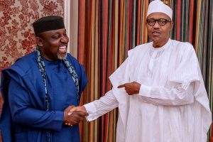 Senator Rochas Okorocha (L) with President Muhammadu Buhari