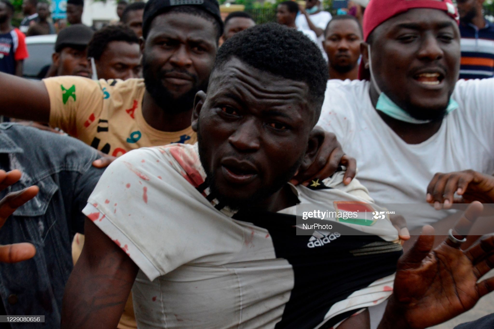 Caught armed thug who attacked #EndSARS protesters saved from mob at Alausa, Ikeja, Lagos, Nigeria on Wednesday, October 14, 2020.(Photo by Adekunle Ajayi/NurPhoto via Getty Images)