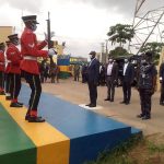 Governor Obaseki taking a salute at the Edo State Police Command