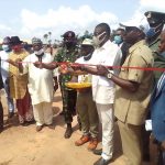 Edo State Deputy Governor Philip Shaibu in a group photograph with the corps members at the NYSC Permanent Orientation Camp, Okada